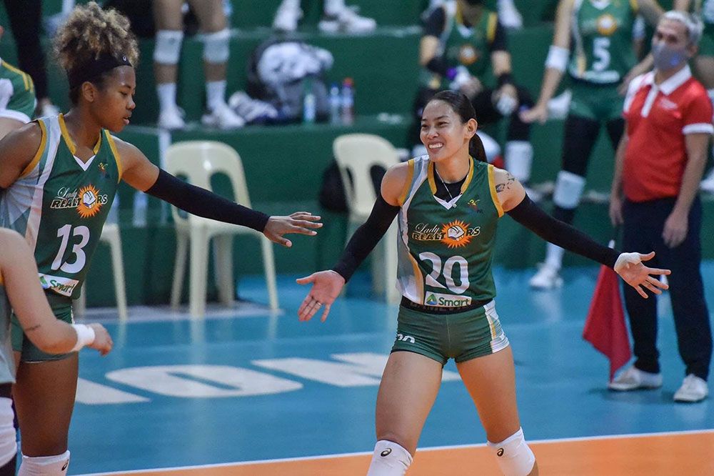 Jonah Sabate of the Lady Realtors celebrates with team mates versus BaliPure in the PVL