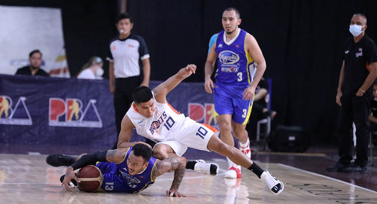 Magnolia forward Calvin Abueva dives for a loose ball against Nards Pinto of Meralco in Game Six.