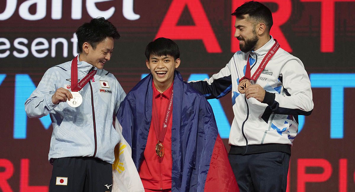 Carlos Yulo all smiles after winning a gold and silver medal at the 50th Artistic Gymnastics World Championship.