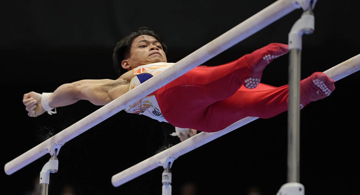 Caloy Yulo wins silver with his routine in the parallel bars.