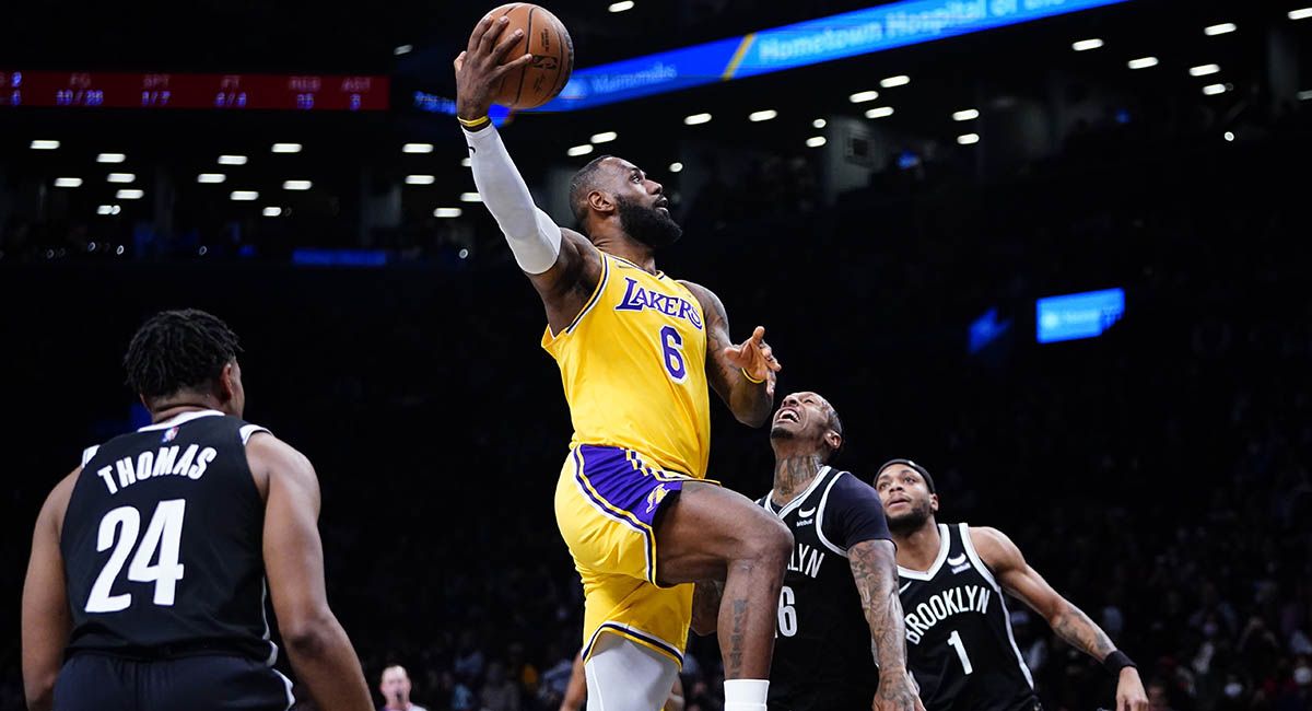 Lakers star LeBron James goes for a layup against the Brooklyn Nets.
