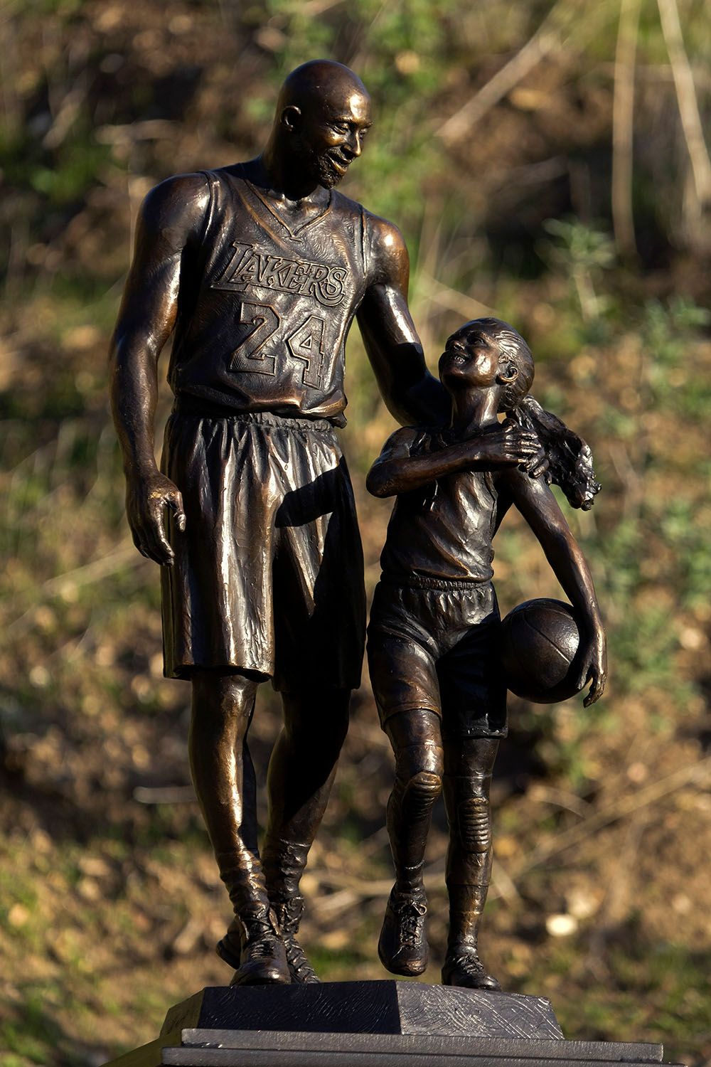 Artist Dan Medina created a bronze sculpture honoring Kobe and Gianna at Calabas County, site of their fateful helicopter crash.