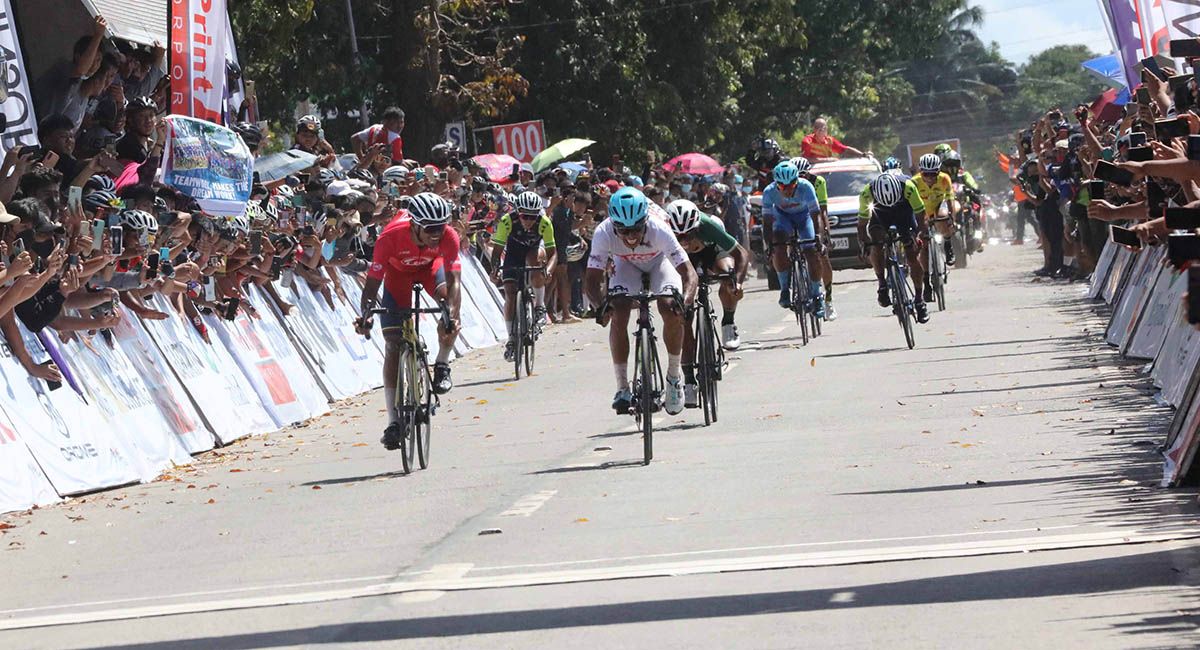 Ronald Oranza and JP Morales cross the finish line at the end of Stage Eight on Friday.