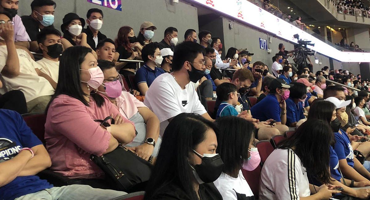 Kai Sotto watches from the stands during the Ateneo-UP game at the MOA Arena.