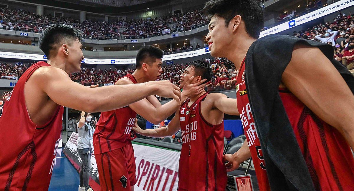 JD Cagulangan and the UP Maroons celebrate the Game Three victory.