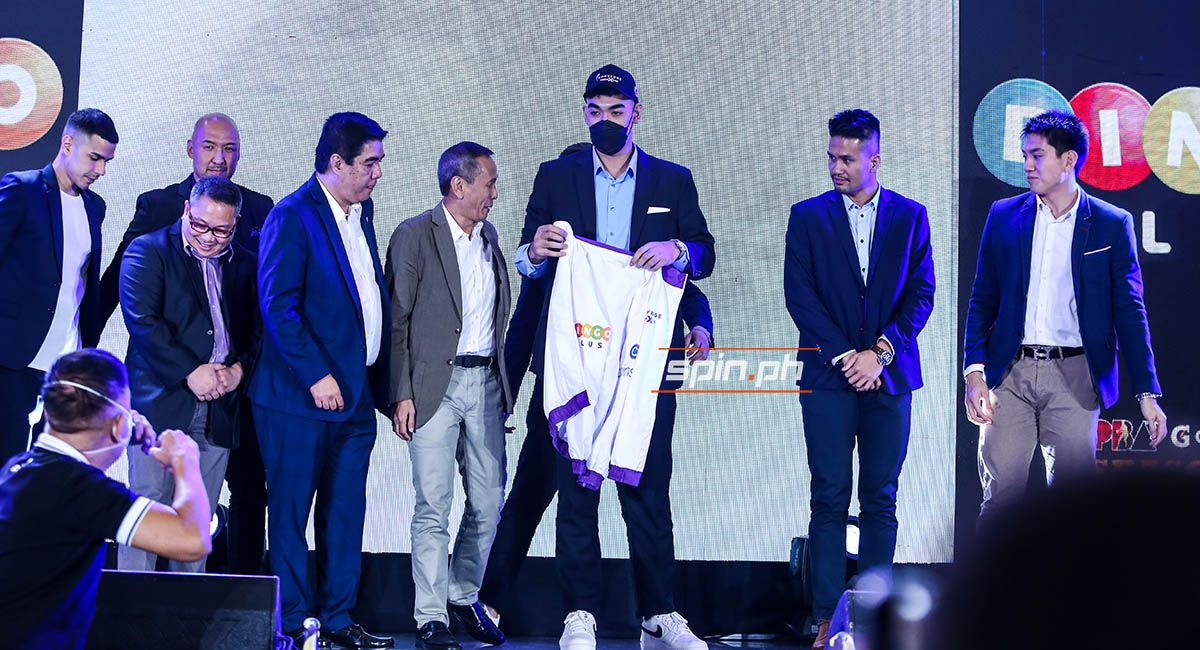 Justin Arana joins Converge officials, coaches and players onstage during the PBA Rookie Draft.