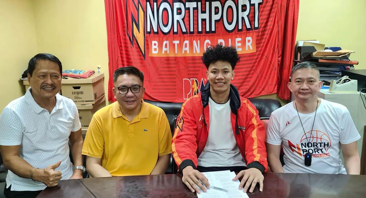 JM Calma signs his first NorthPort contract on Thursday.