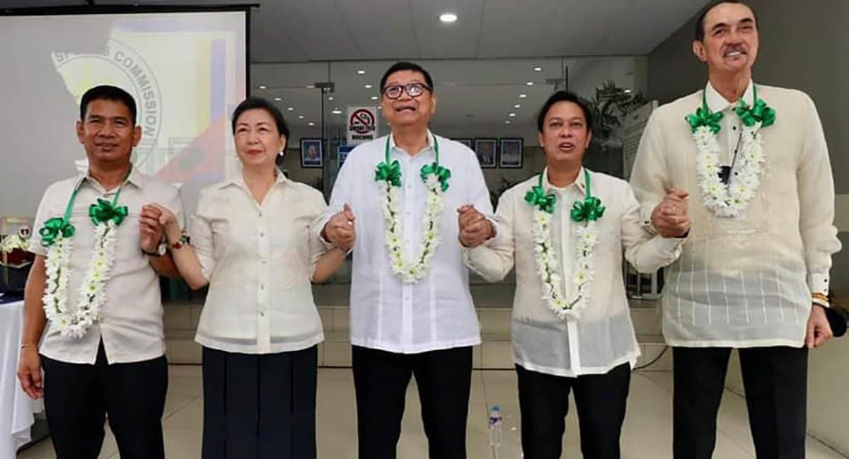PSC chairman Butch Ramirez and commissioners Ramon Fernandez, Charles Maxey, Celia Kiram, and Arnold Agustin feted during the final flag-raising ceremony under their term.