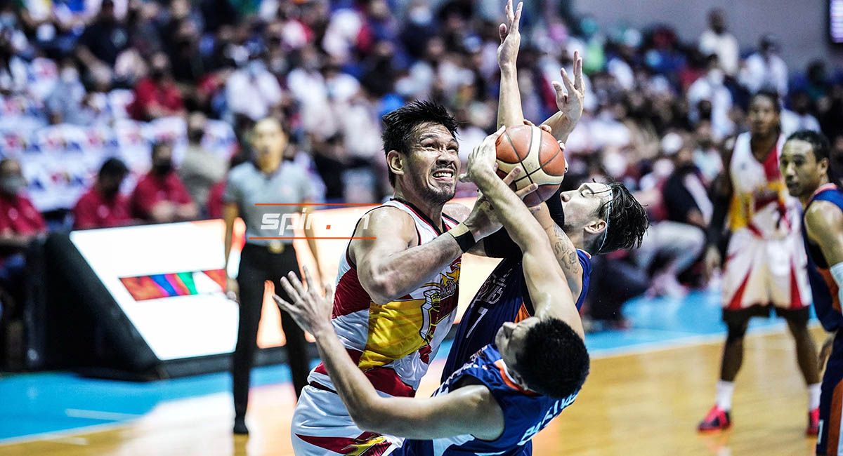 SMB's June Mar Fajardo powers his way for two points against a Meralco double-team. 