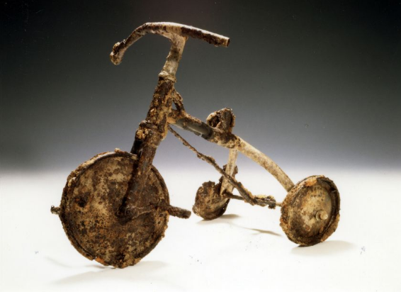 A toddler's tricycle or what's left of it after the Hiroshima bombing. 